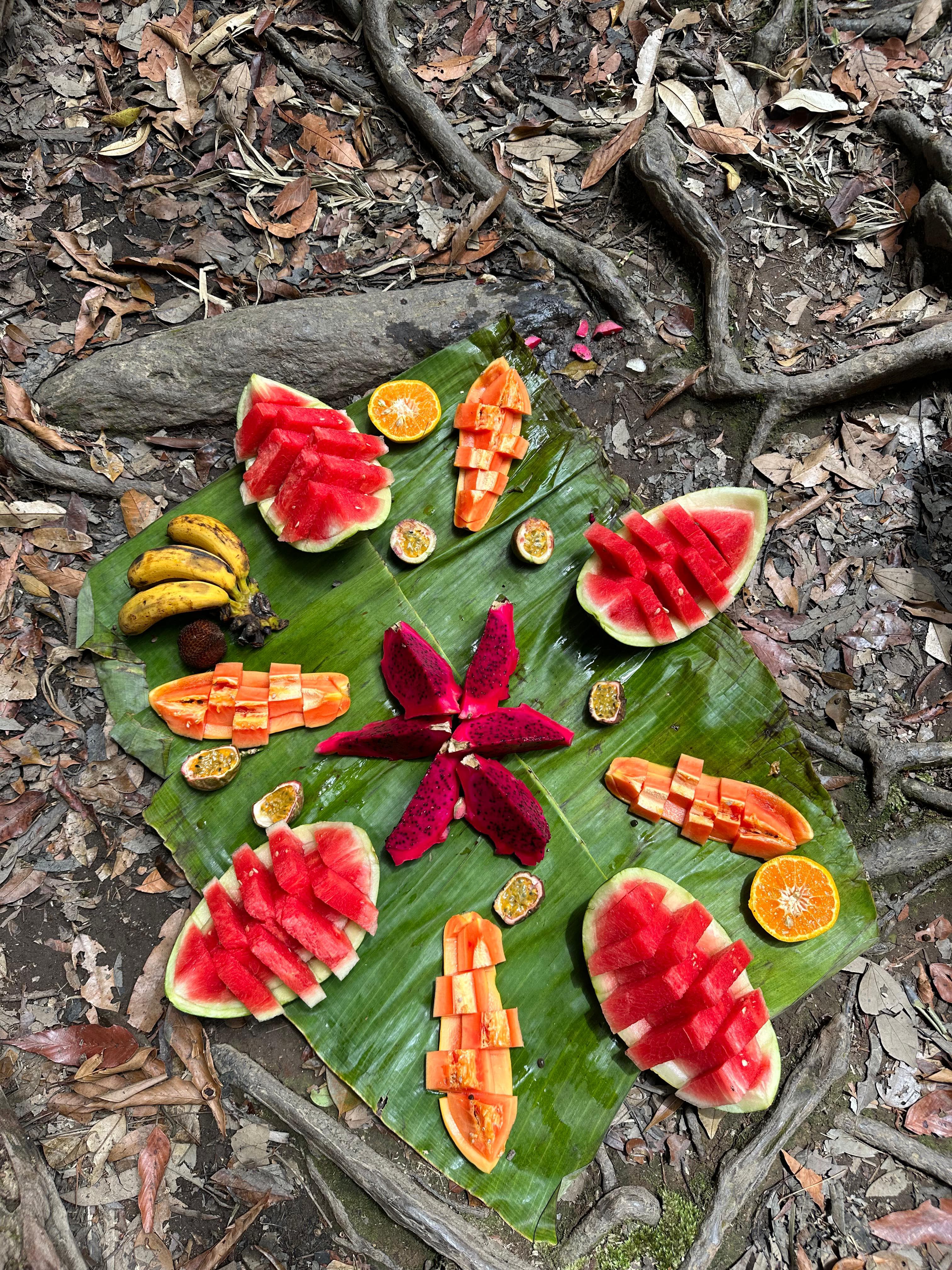 Tropical fruit arrangement on banana leaf